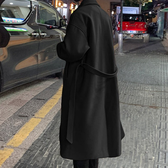 Long belted overcoat with notched lapels and side pockets