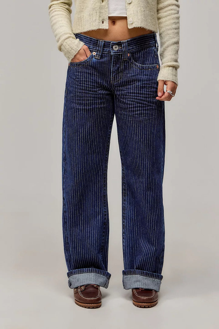 Women's wide-leg pinstripe jeans with mid-rise waist and front pockets