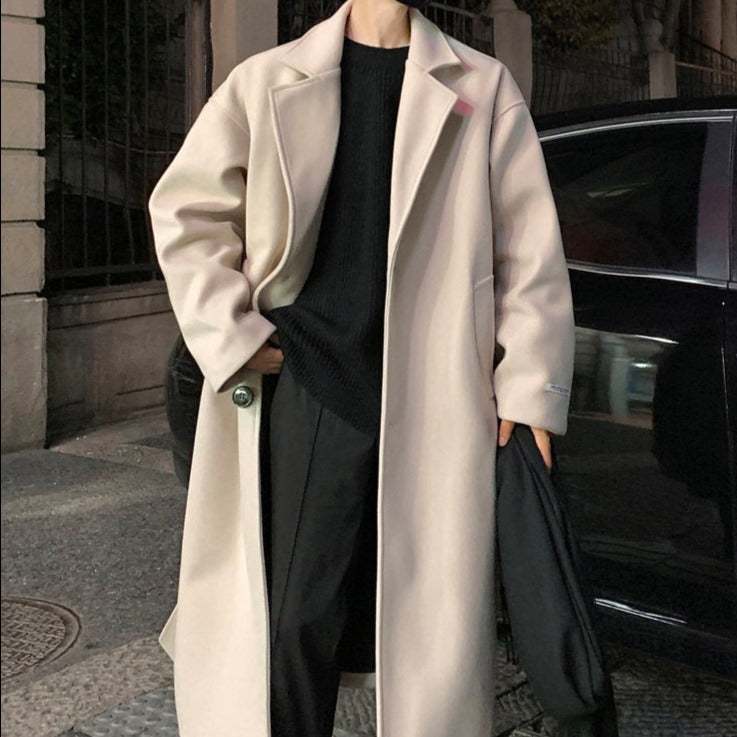 Long belted overcoat with notched lapels and side pockets