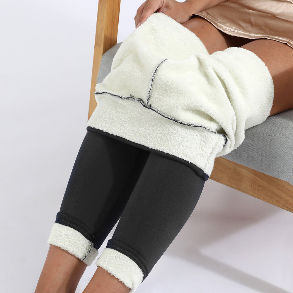 Women's high-rise fleece-lined leggings shown with plush lining and ankle-length legs
