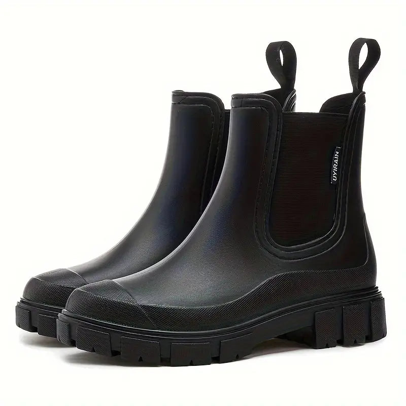 Women's Chelsea ankle boots with elastic side panels, pull tabs and chunky lug soles