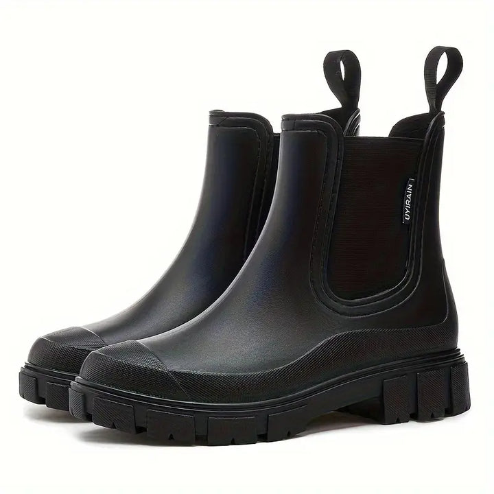 Women's Chelsea ankle boots with elastic side panels, pull tabs and chunky lug soles