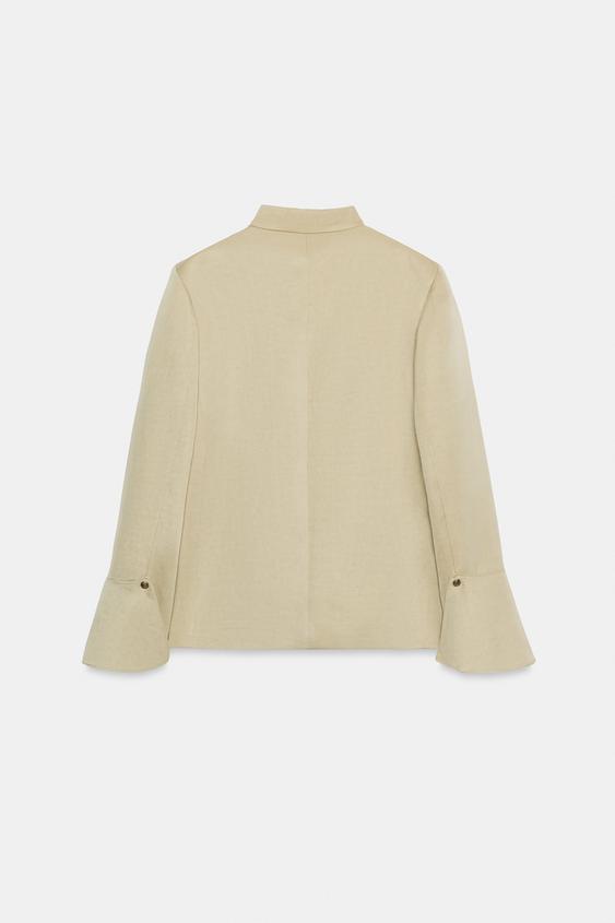 Women's cropped jacket with mandarin collar, long sleeves and flared cuffs