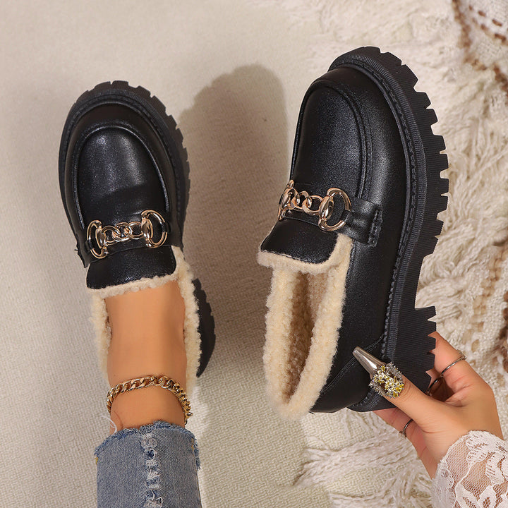 Women's plush lined loafers with decorative upper detail and chunky lug soles