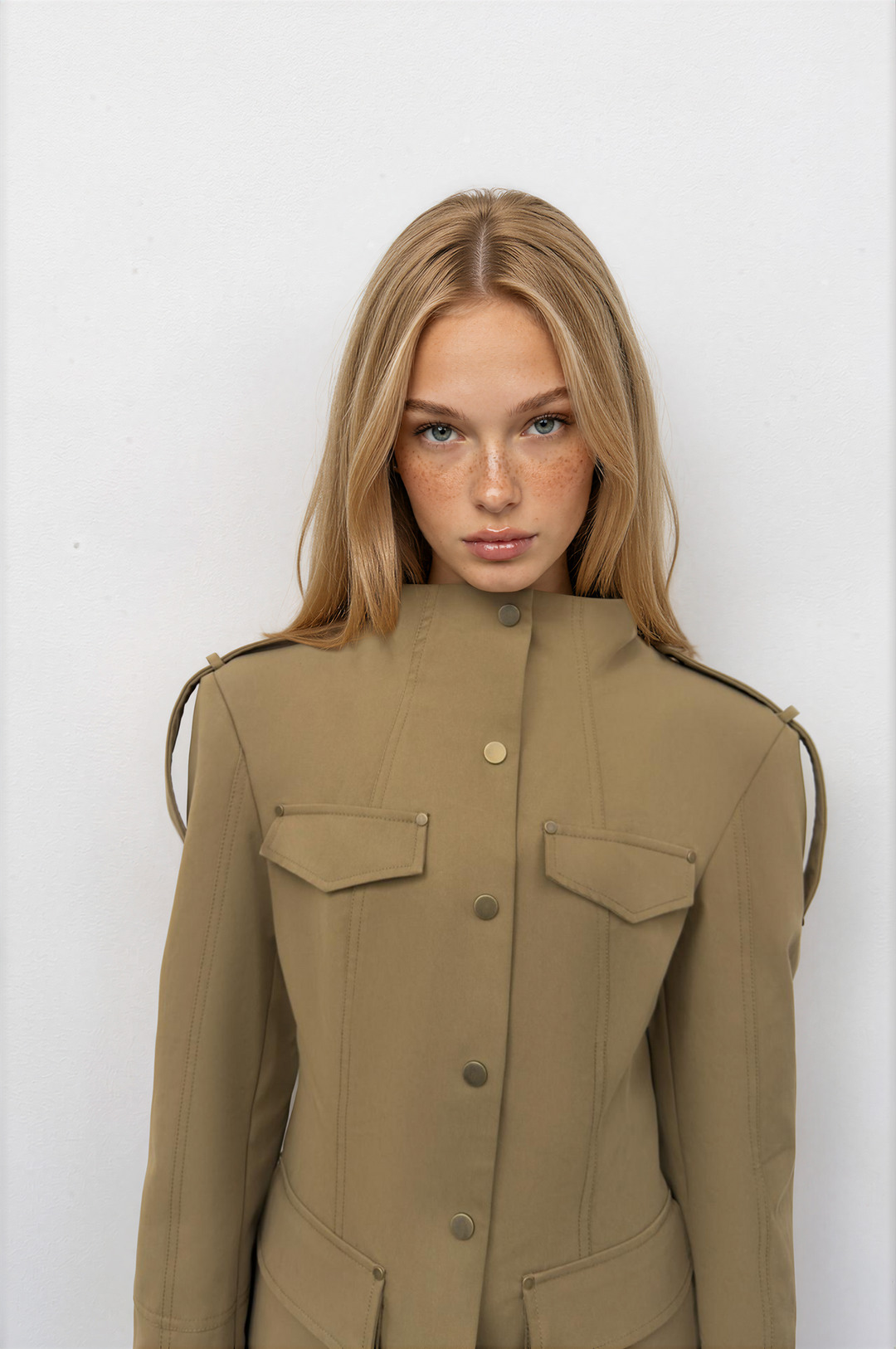 Women's khaki military jacket with stand collar and flap pockets