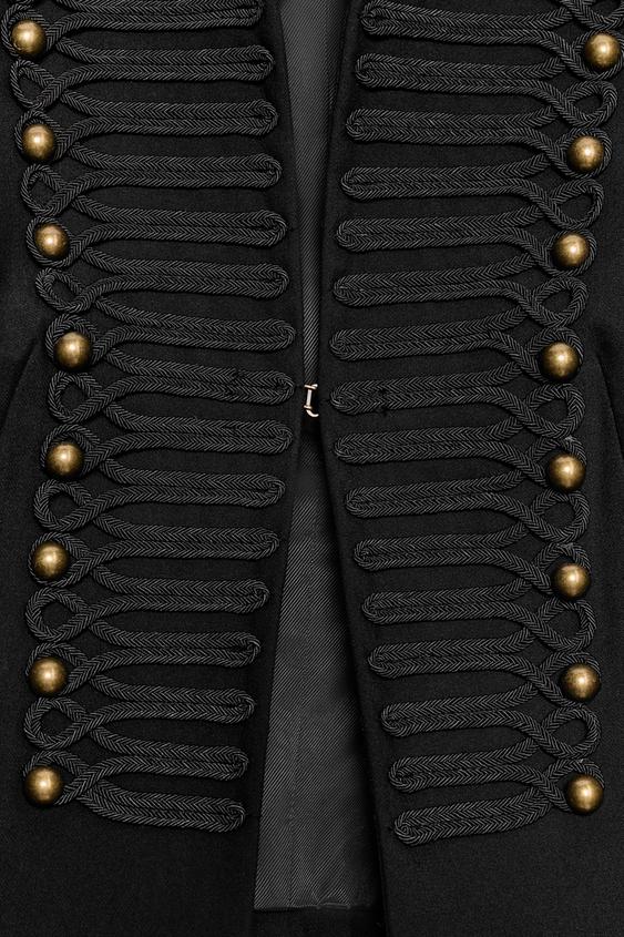 Women's cropped military style jacket with mandarin collar and decorative front trim