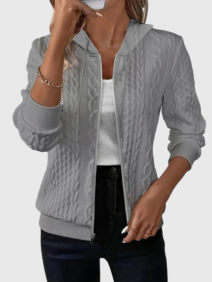 Women's hooded textured zip jacket with long sleeves and ribbed trims