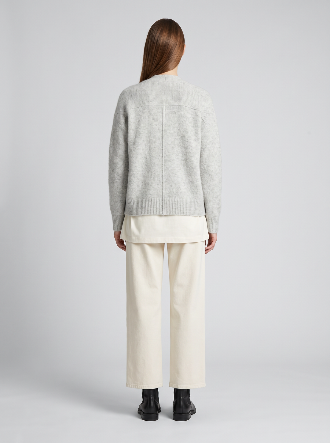 Women's grey oversized knit cardigan with buttons and long sleeves