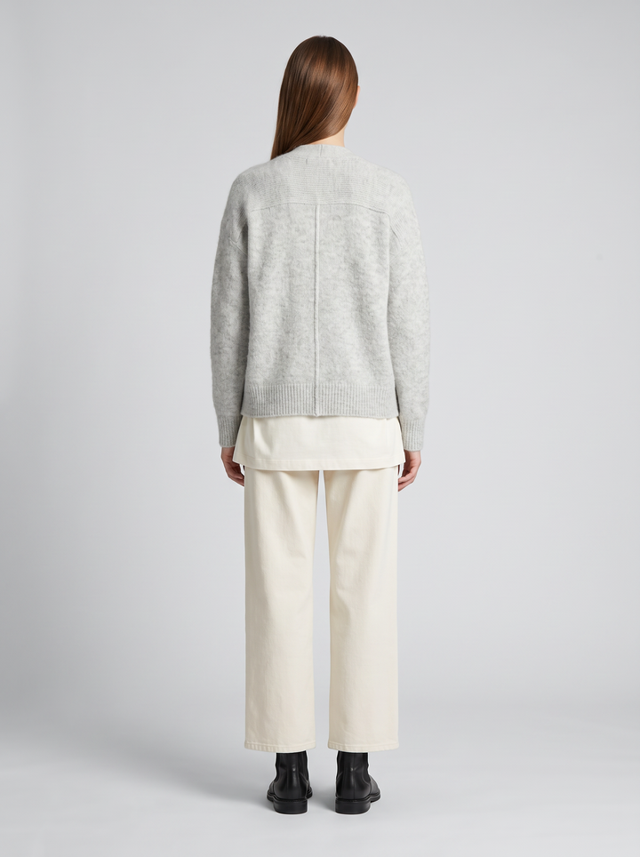 Women's grey oversized knit cardigan with buttons and long sleeves