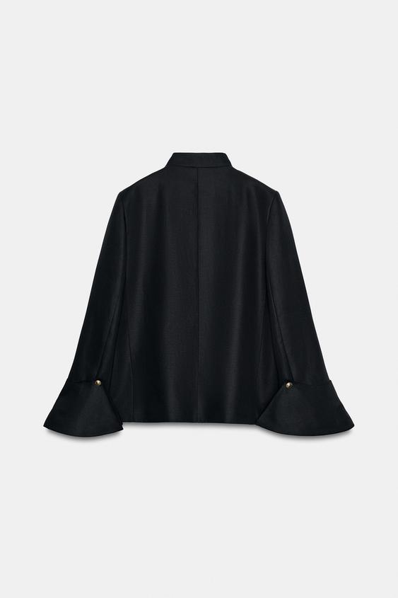 Women's cropped jacket with mandarin collar, long sleeves and flared cuffs