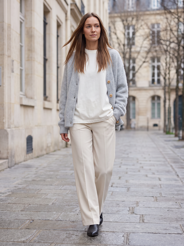 Women's grey oversized knit cardigan with buttons and long sleeves