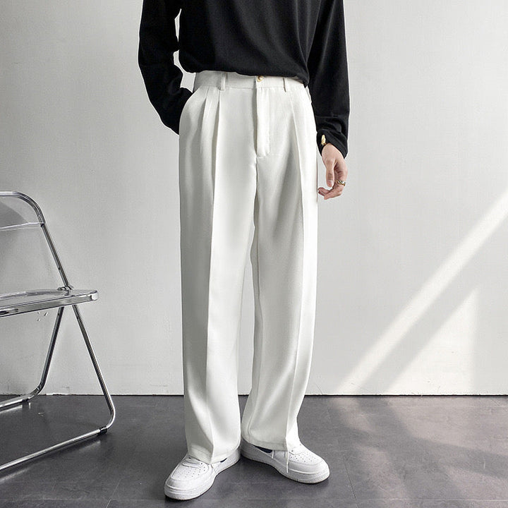 Women's high-rise pleated straight-leg trousers with belt loops and full-length hems