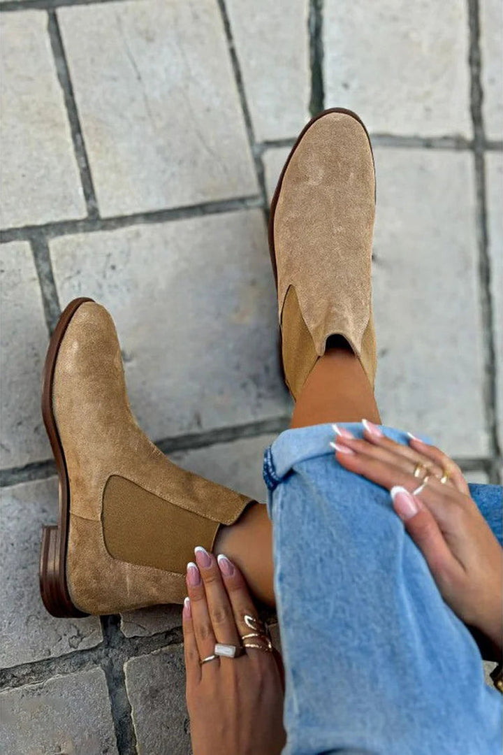 Women's khaki Chelsea ankle boots with rounded toes and elastic side panels