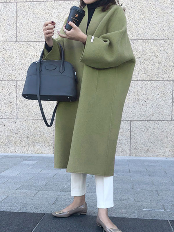Women's collarless longline coat with open front and wide sleeves