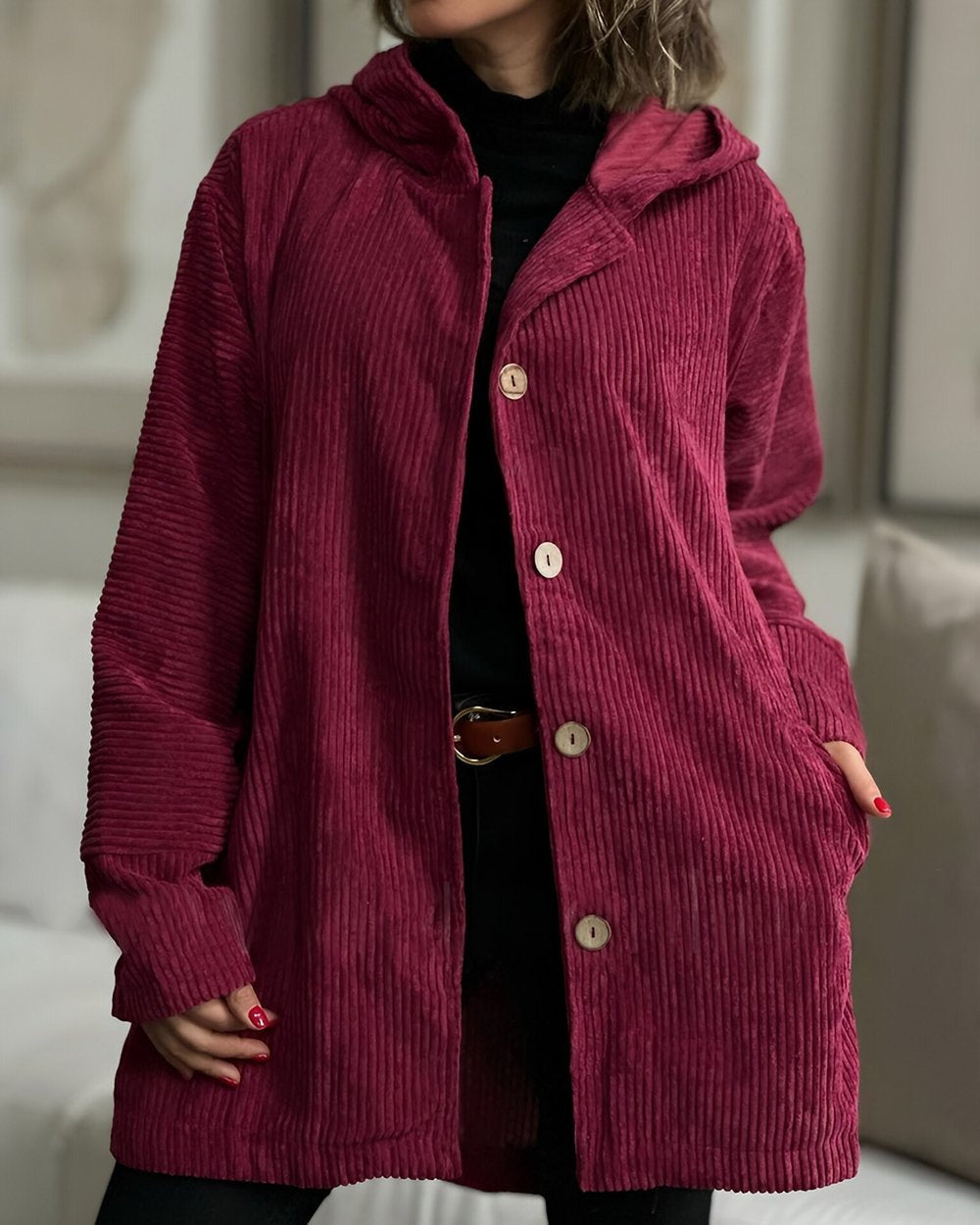 Women's hooded ribbed longline jacket with button front and angled pockets