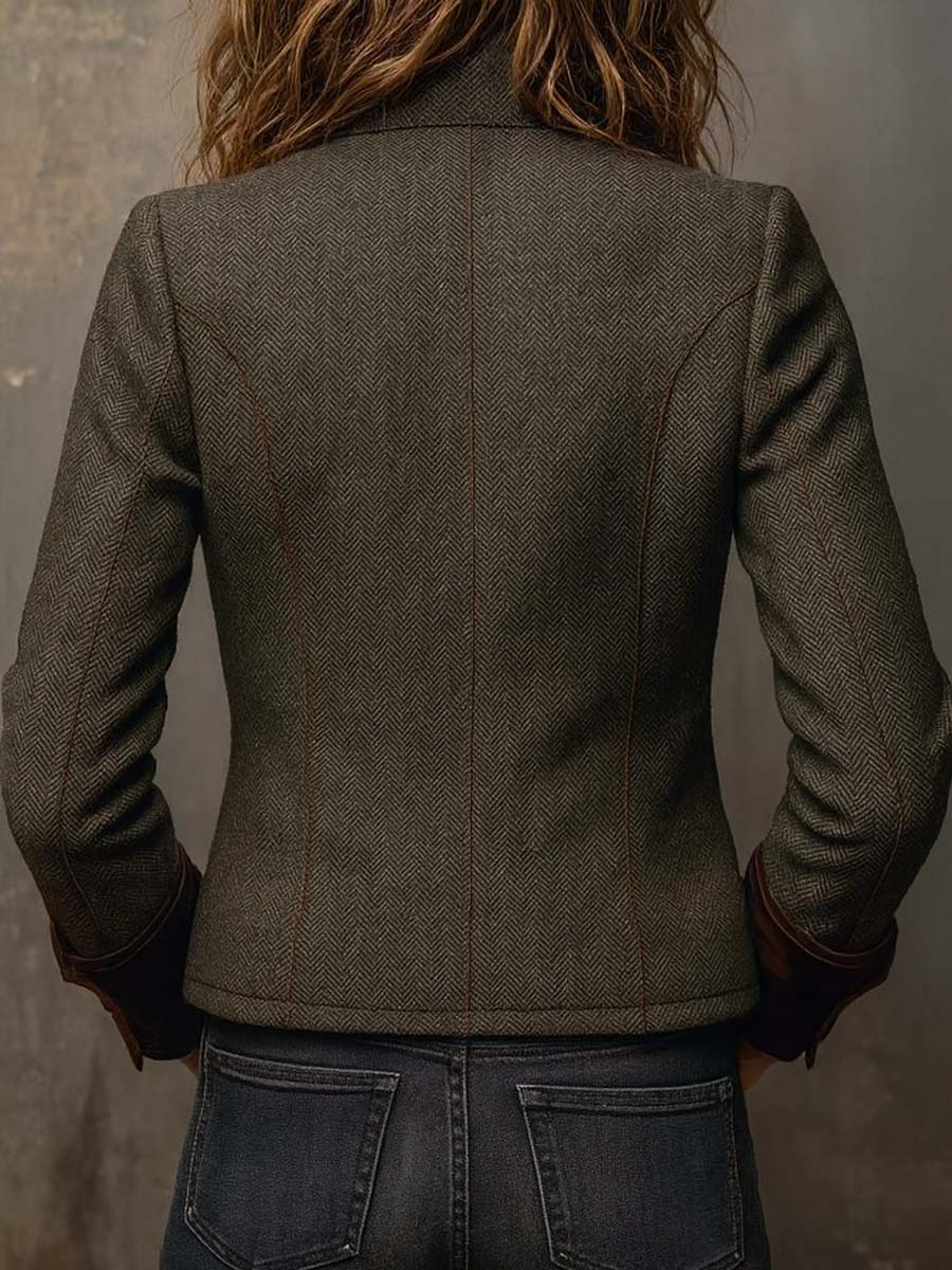 Women's green herringbone blazer with brown contrast trim and button front