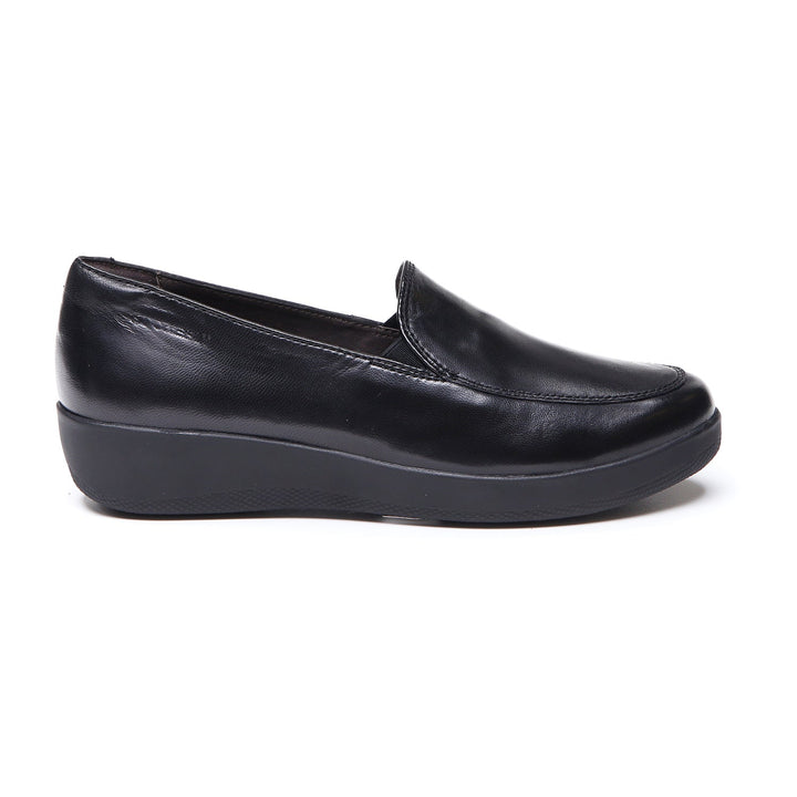 Women's black slip-on loafer with rounded toe and low wedge sole