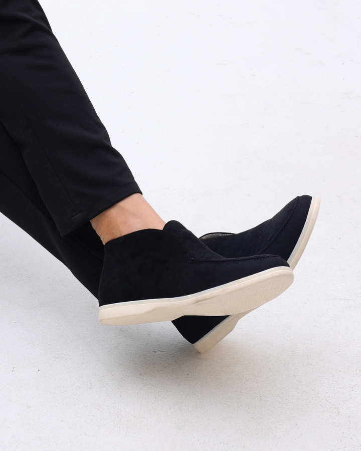 High-top slip-on loafers with rounded moc toes and flat light-coloured soles
