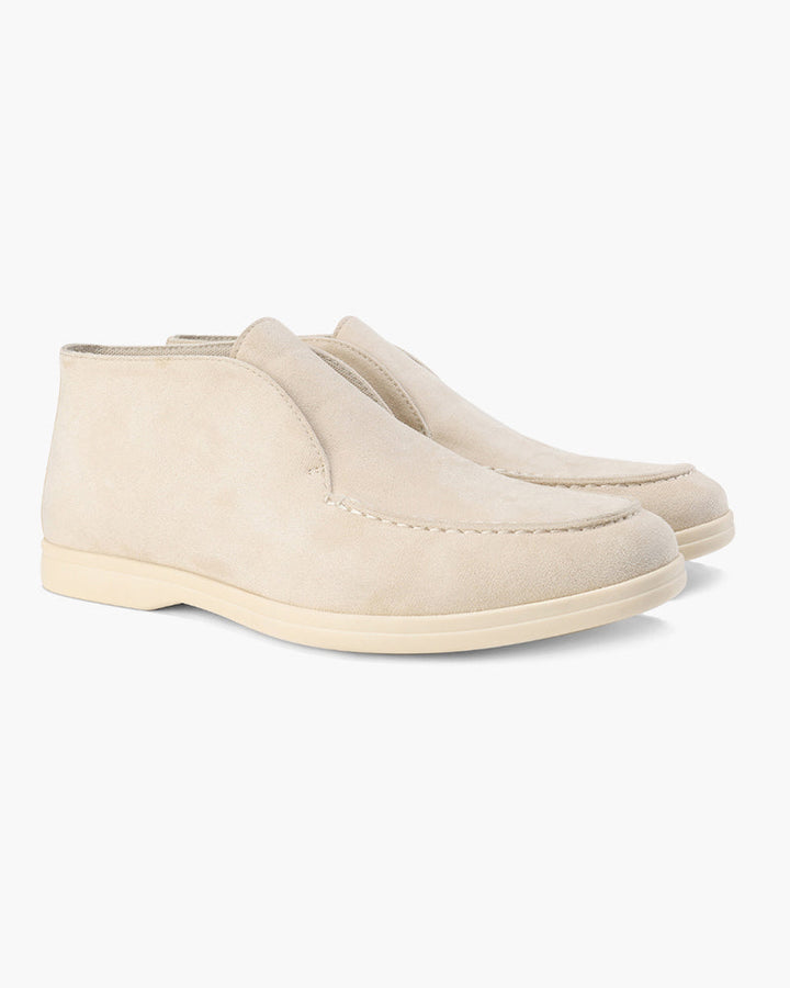 High-top slip-on loafers with rounded moc toes and flat light-coloured soles
