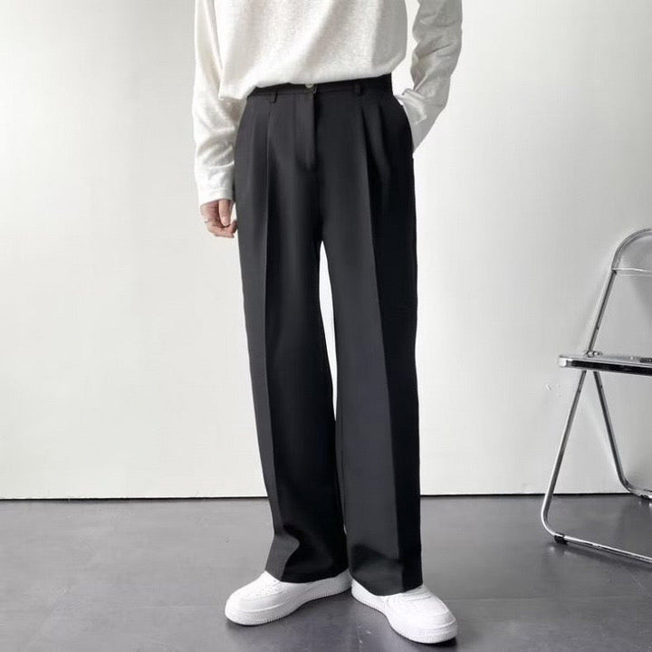 Women's high-rise pleated straight-leg trousers with belt loops and full-length hems
