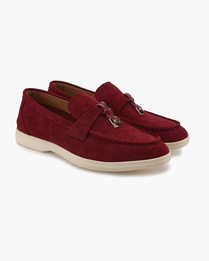 Women's slip-on loafers with penny straps and metal trim