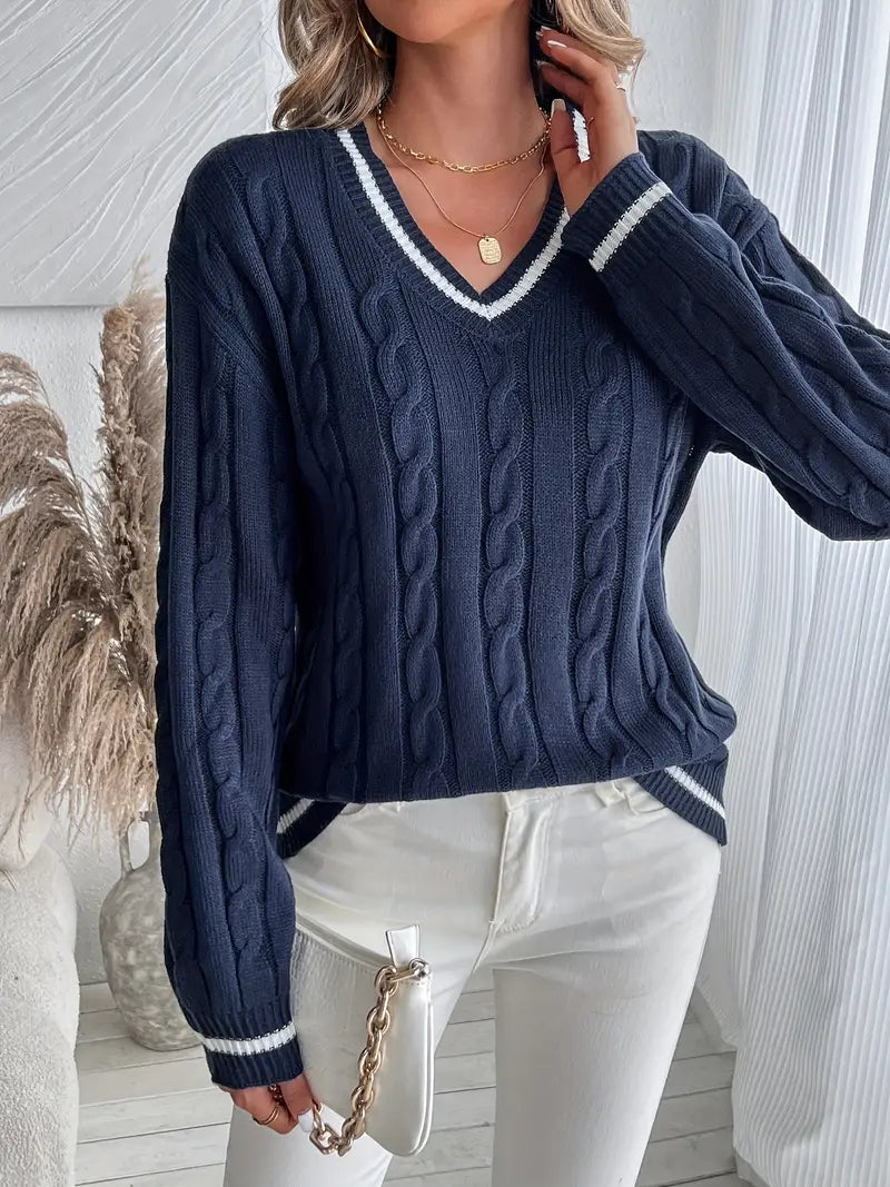 Women's navy cable knit V-neck sweater with white striped trim