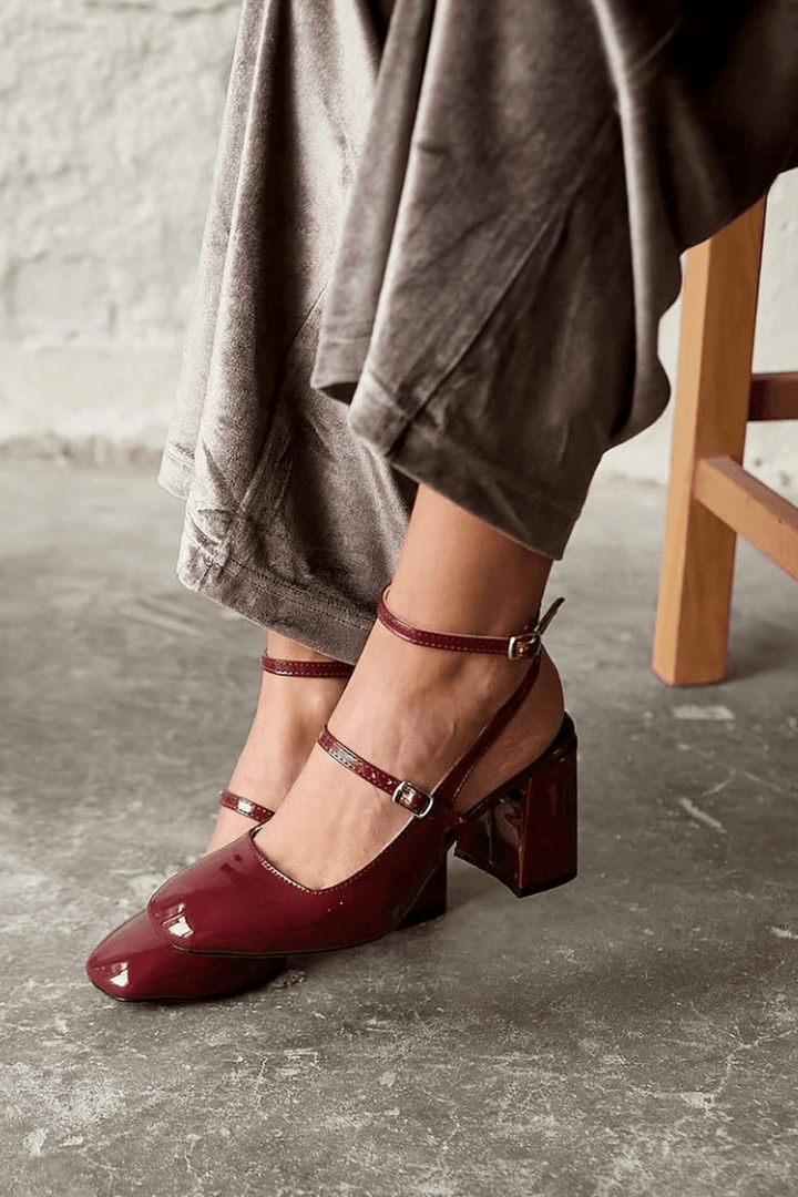 Glossy burgundy Mary Jane pumps with double ankle straps and chunky block heels
