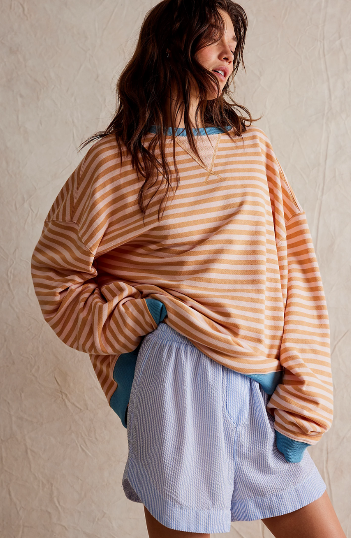 Women's oversized striped crewneck sweater with long sleeves and ribbed trims