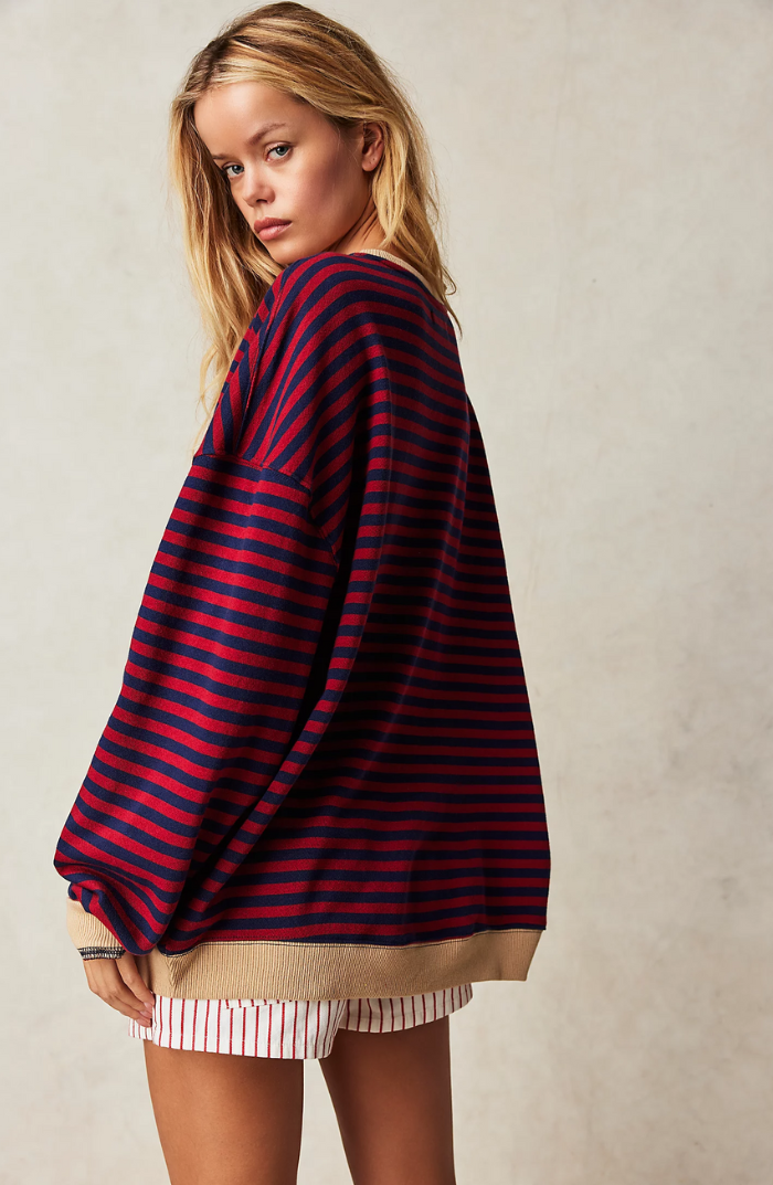 Women's oversized striped crewneck sweater with long sleeves and ribbed trims