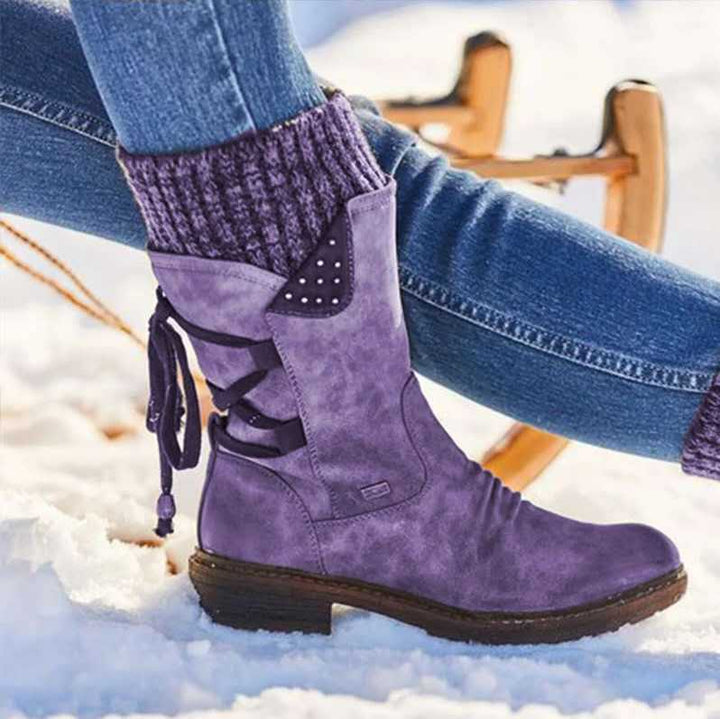 Women's winter boots with knitted cuffs, side zippers and lace-up details