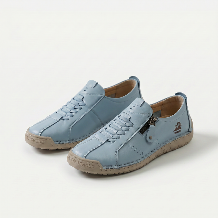 Women's low-profile lace-up sneakers with side zipper and flat sole