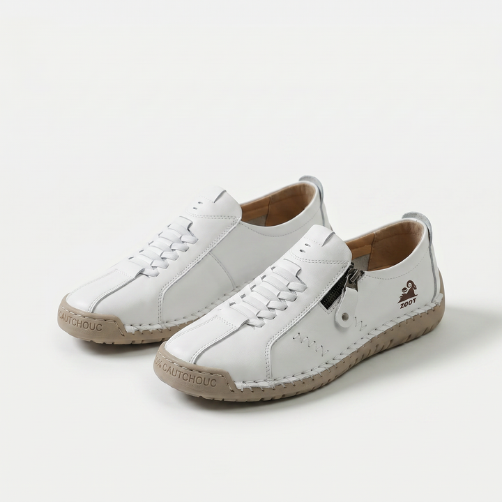 Women's low-profile lace-up sneakers with side zipper and flat sole