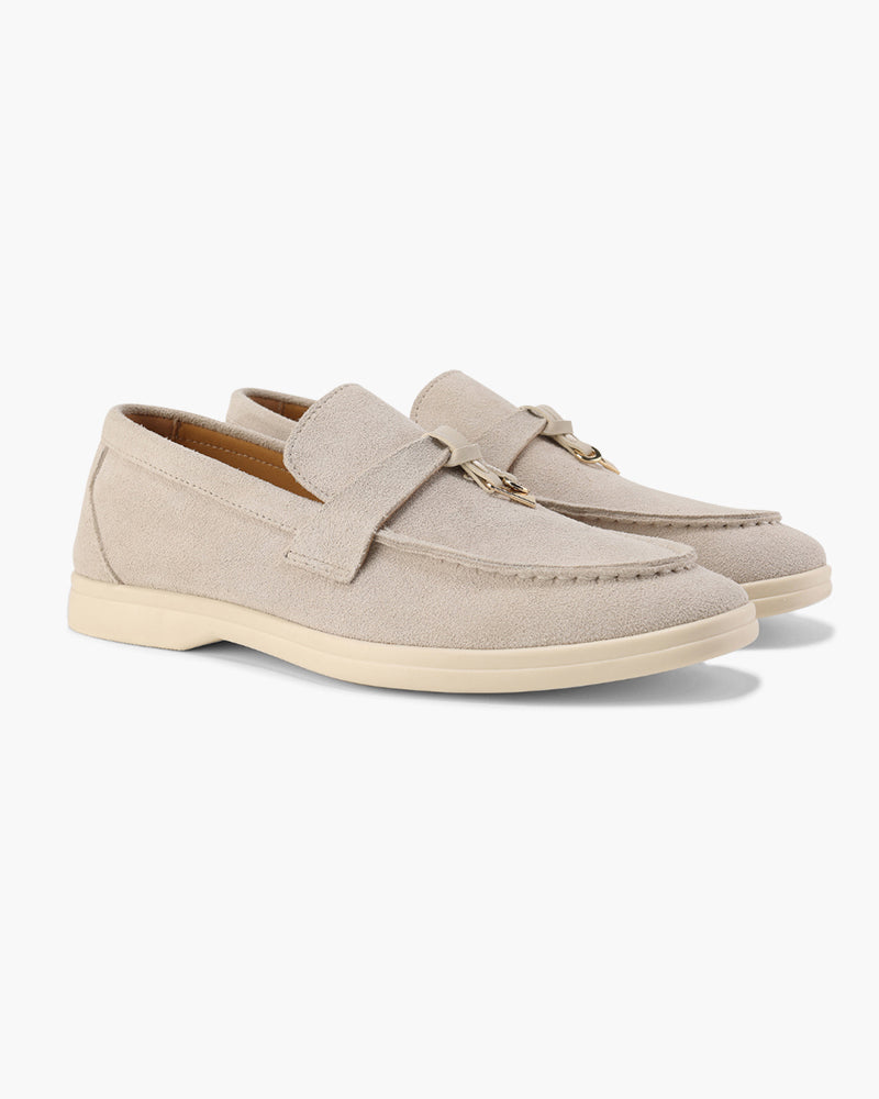 Women's slip-on loafers with penny straps and metal trim