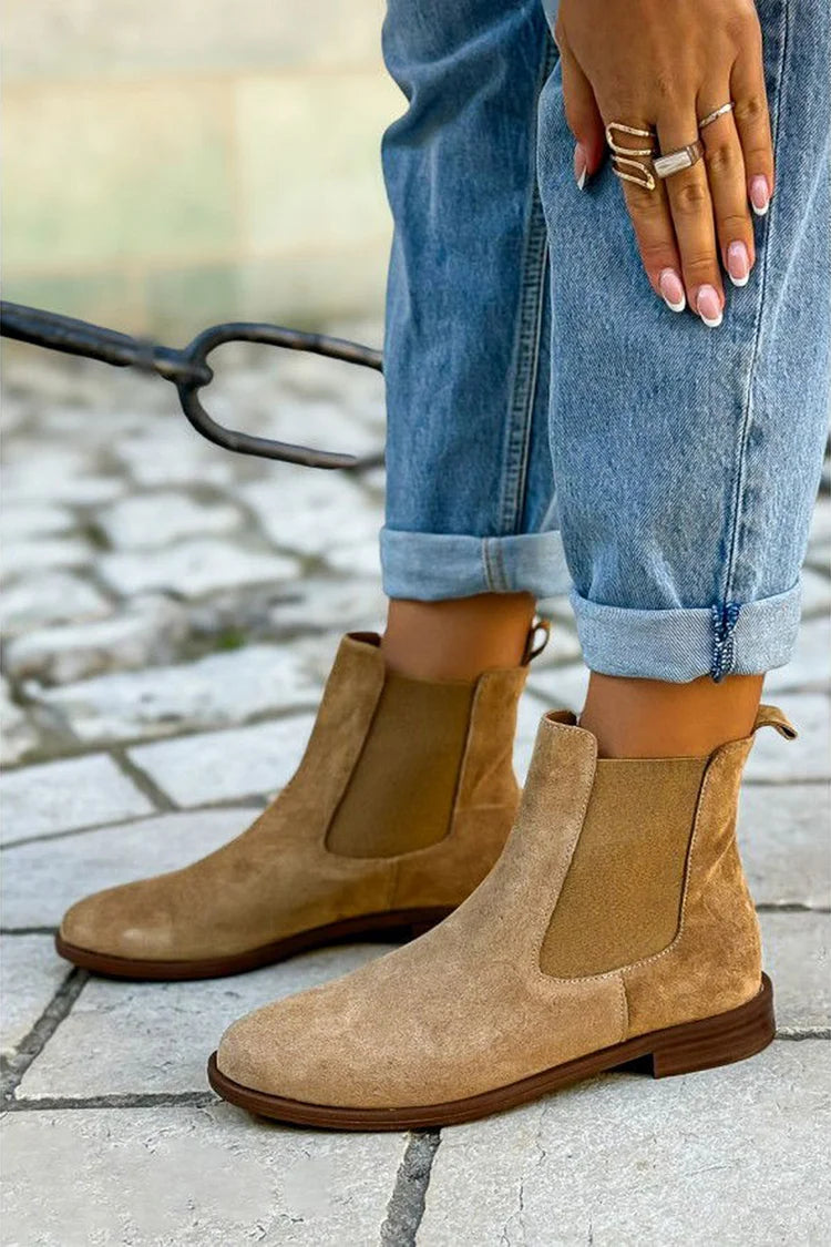 Women's khaki Chelsea ankle boots with rounded toes and elastic side panels