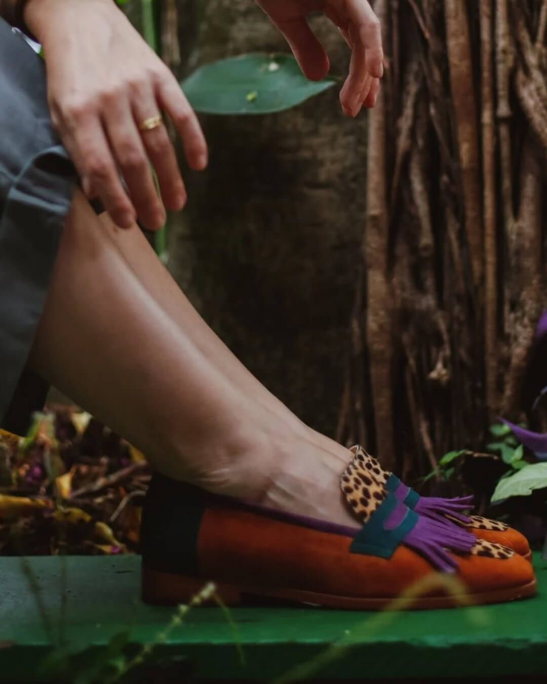 Brown leopard print women's loafers with square toes and purple fringe