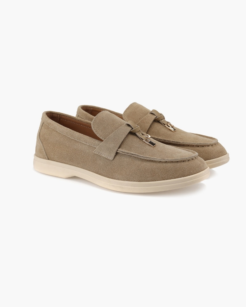 Women's slip-on loafers with penny straps and metal trim