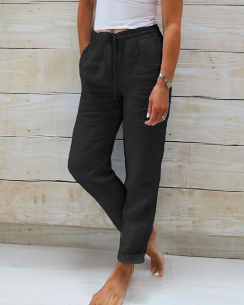 Women's tapered trousers with elastic drawstring waist and side pockets
