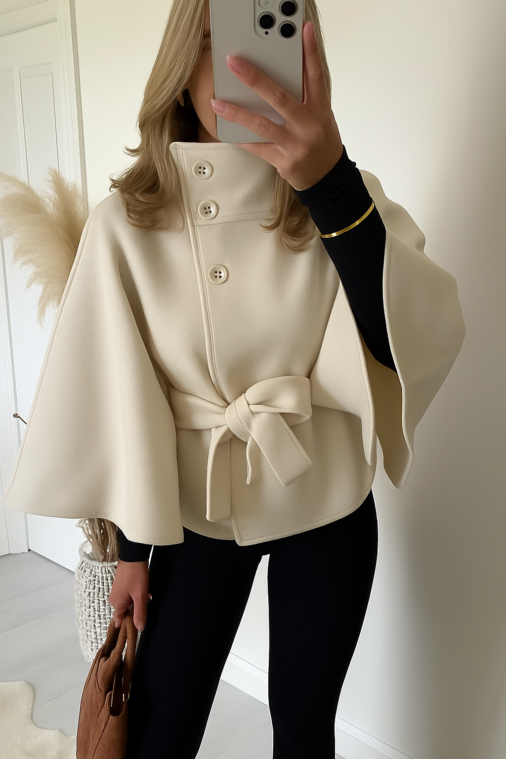 Women's cape coat with stand collar, button front and waist tie