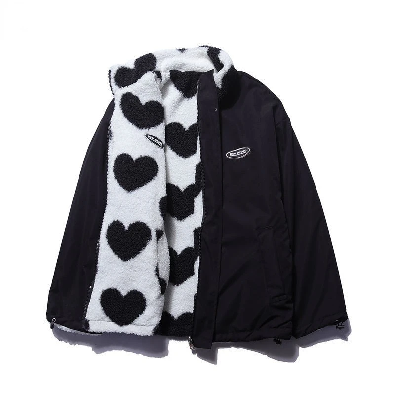 Reversible jacket with heart-patterned textured side, high collar and zip front