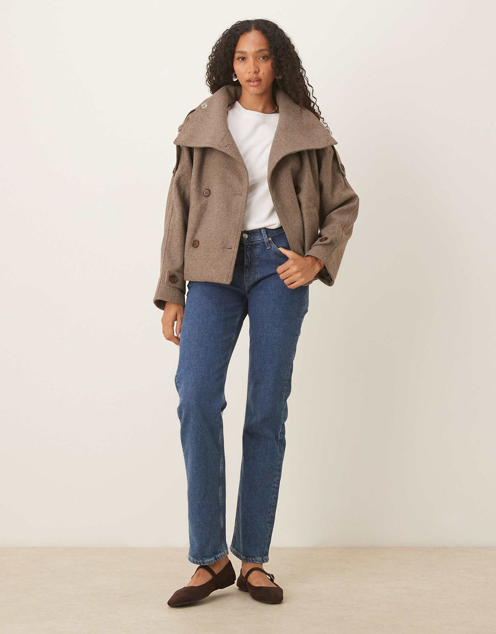 Women's brown funnel-neck coat with button front and long sleeves