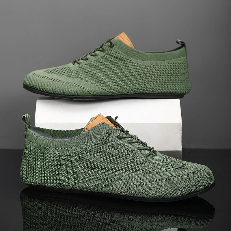 Knit lace-up shoes with round toes, flat soles and heel pull tabs