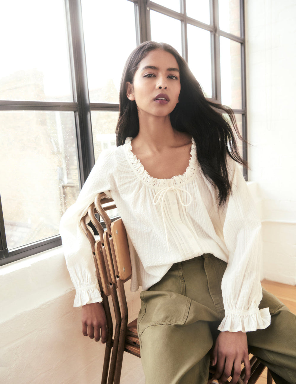 Women's khaki cropped utility trousers with straight legs and patch pockets