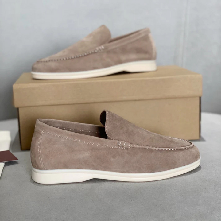 Women's suede-finish slip-on loafers with rounded moc toes and contrasting flat soles