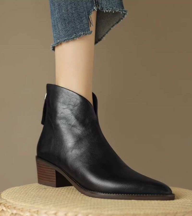 Women's pointed toe ankle boots with angled topline and block heel