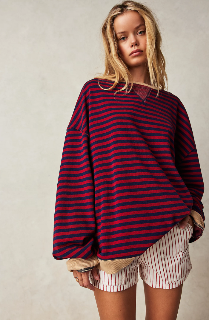 Women's oversized striped crewneck sweater with long sleeves and ribbed trims
