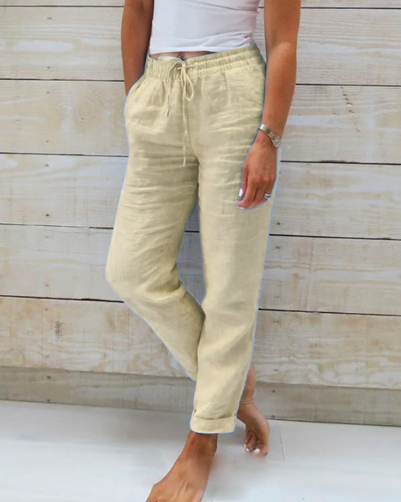 Women's tapered trousers with elastic drawstring waist and side pockets