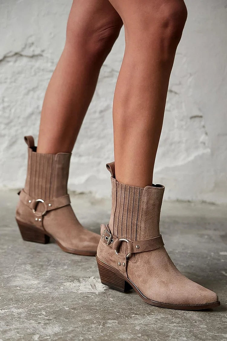 Brown women's western ankle boots with pointed toes, buckle straps and chunky block heels