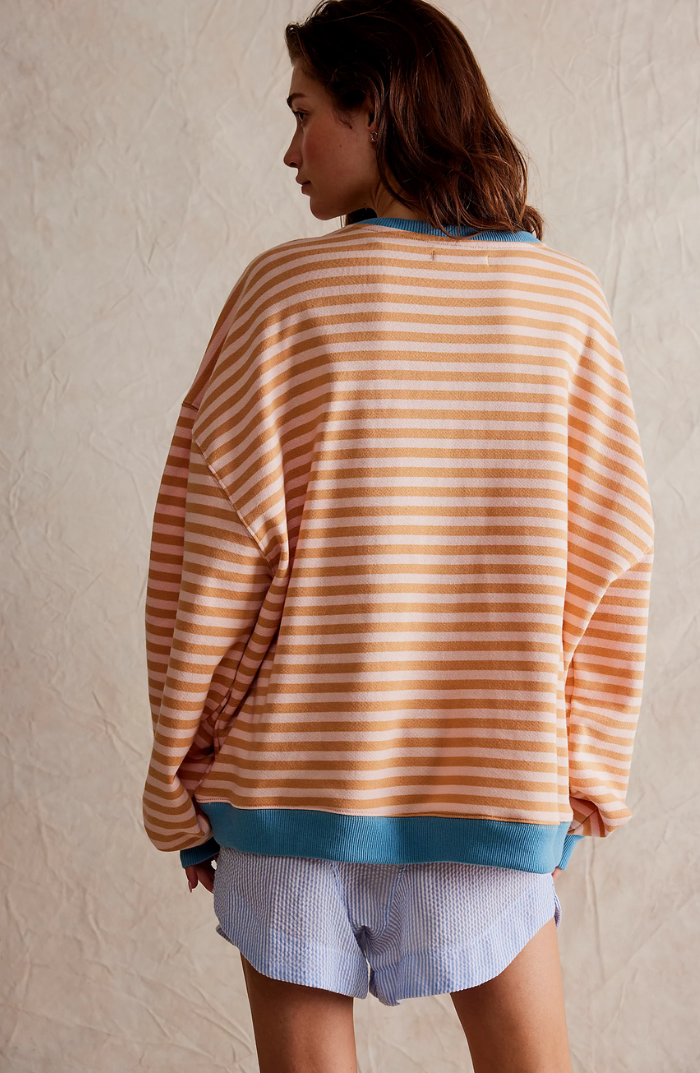 Women's oversized striped crewneck sweater with long sleeves and ribbed trims