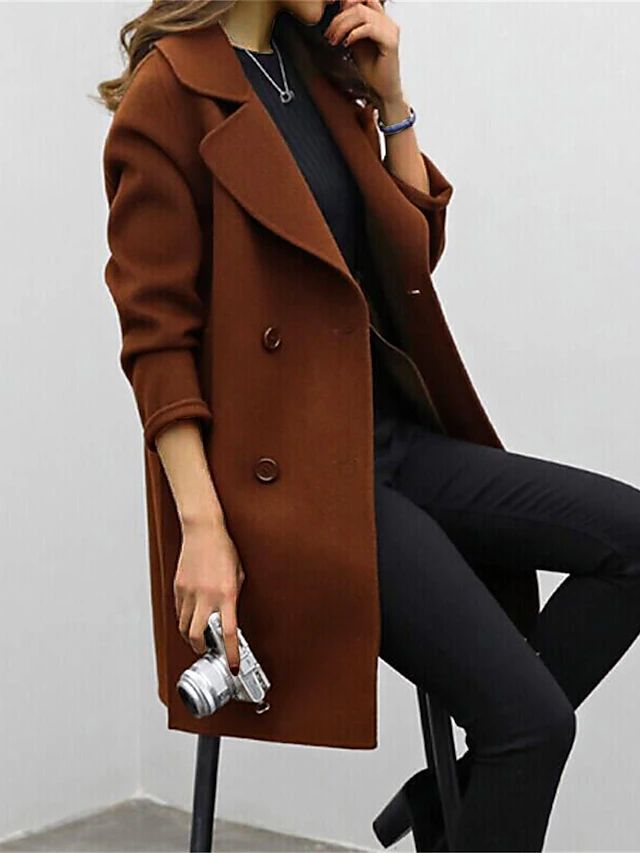 Women's long button front coat with wide lapels and long sleeves