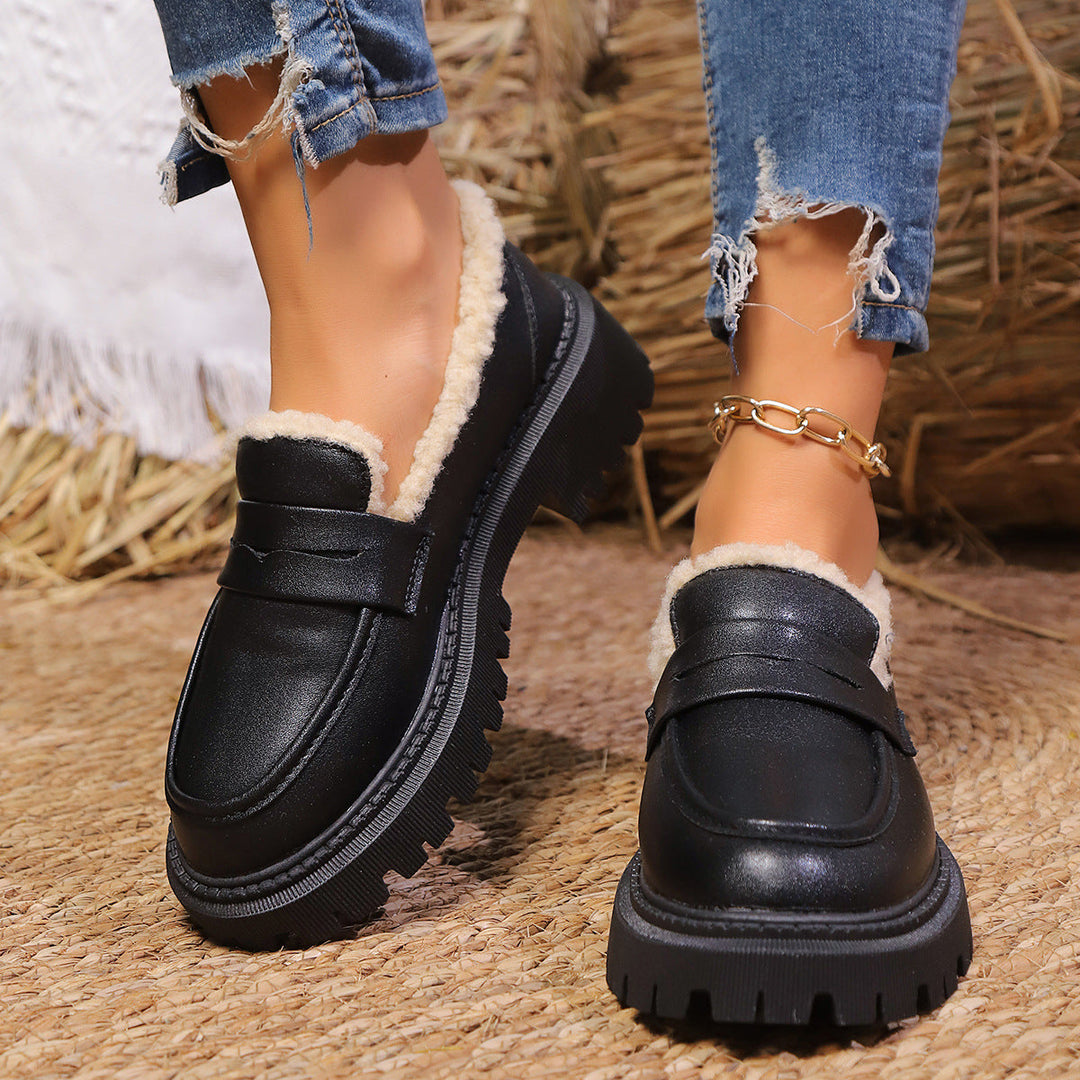 Women's plush lined loafers with decorative upper detail and chunky lug soles